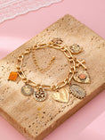 Load image into Gallery viewer, Charm Bracelet, Cross Heart Oval Motifs