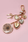 Load image into Gallery viewer, BAG CHARM, DRIED FLOWER BOW HEART PEARL
