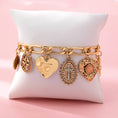 Load image into Gallery viewer, Charm Bracelet, Cross Heart Oval Motifs
